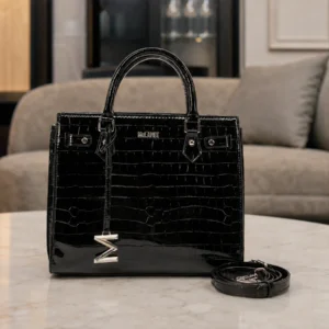 A black, crocodile-textured Structured Top Handle Bag by McLANEE with top handles and a detachable strap