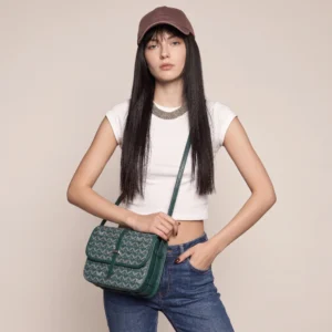 Woman styling the McLANEE Mayfair Monogram Crossbody Bag with jeans and trainers 